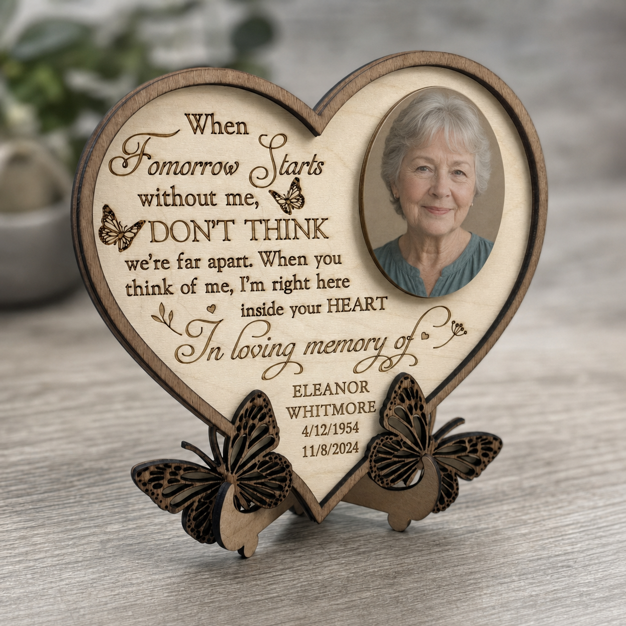 Angled view of personalized heart memorial plaque with fictional sample identity