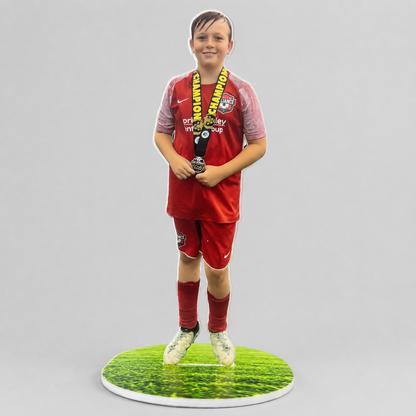 Personalized sports action statue on a flat grass-print acrylic base
