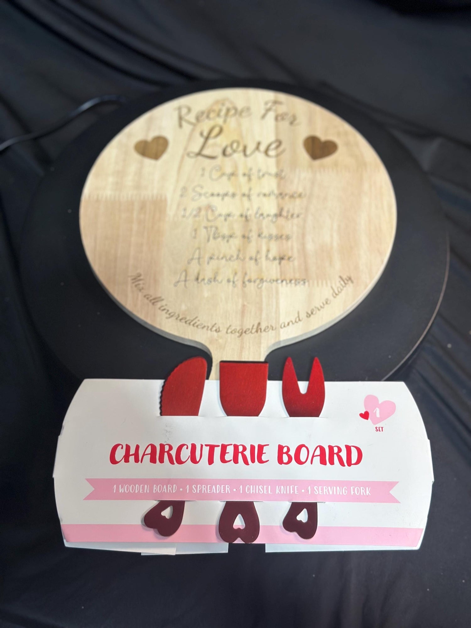 Round Charcuterie Board with Red Utensils